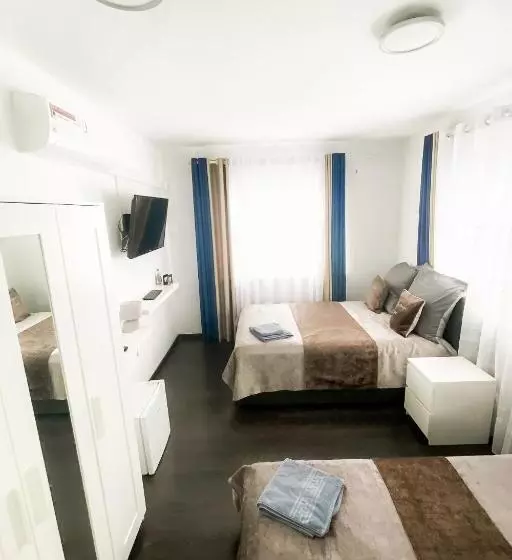 ペンション Tau Design