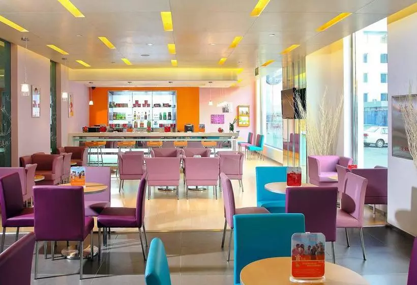 Отель Qiu Guo  Capital Airport