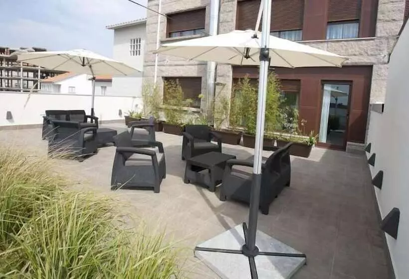 Отель Natura Petit