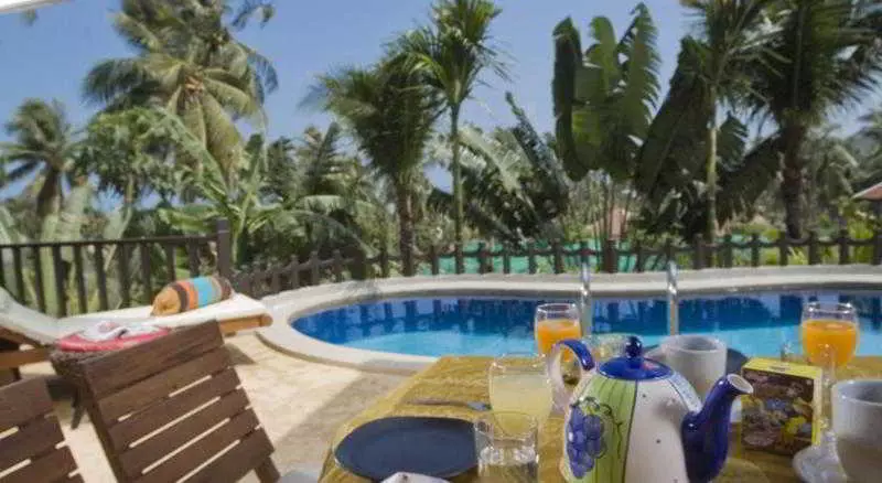 בית מלון כפרי Paradise Island Estate