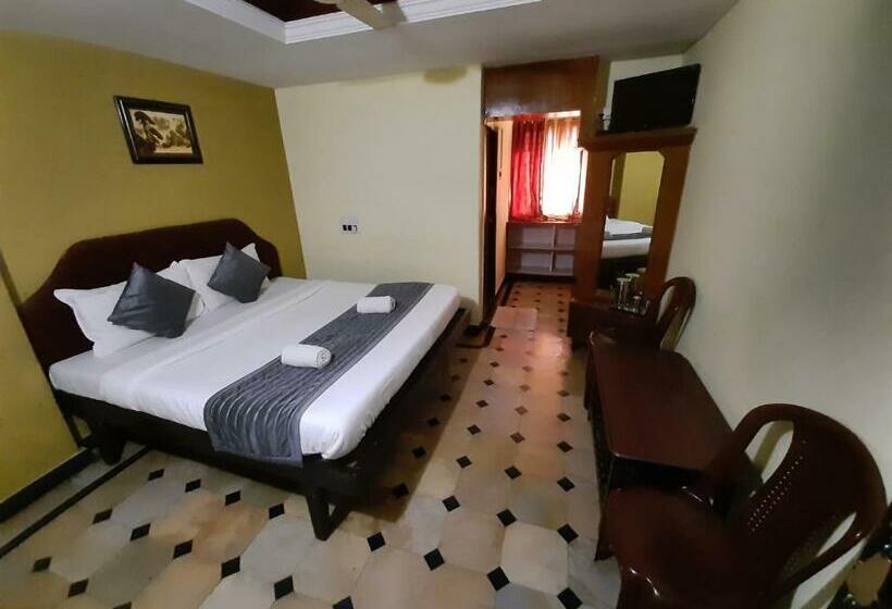 Отель Caveri Comfort Inn