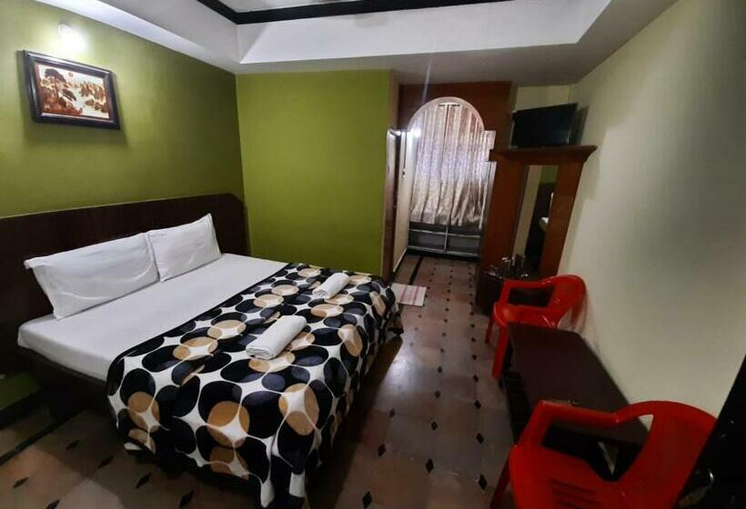 Отель Caveri Comfort Inn