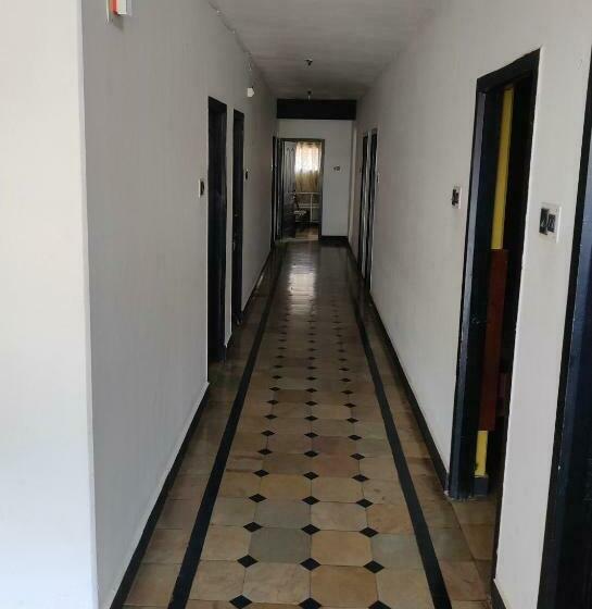 Отель Caveri Comfort Inn