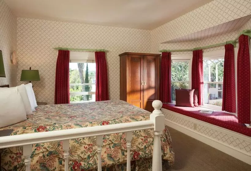 酒店 Cheshire Cat Inn & Cottages