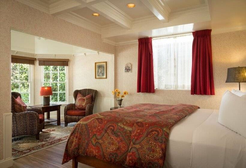 酒店 Cheshire Cat Inn & Cottages