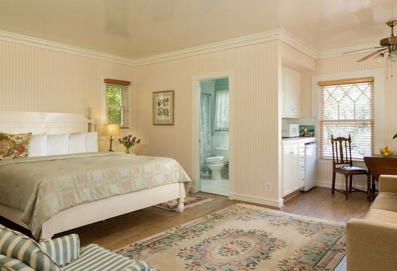 酒店 Cheshire Cat Inn & Cottages