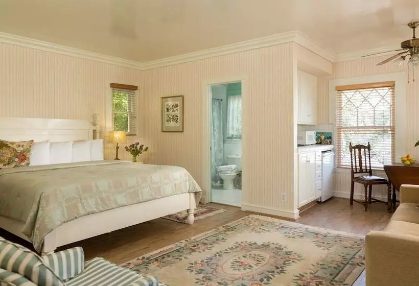 酒店 Cheshire Cat Inn & Cottages