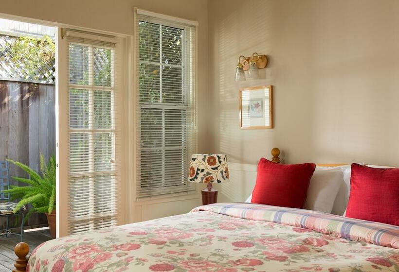 酒店 Cheshire Cat Inn & Cottages