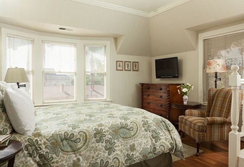 酒店 Cheshire Cat Inn & Cottages