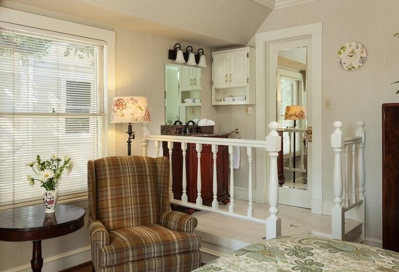 酒店 Cheshire Cat Inn & Cottages