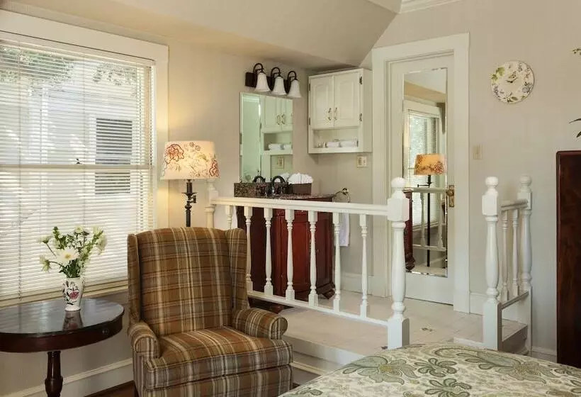 酒店 Cheshire Cat Inn & Cottages