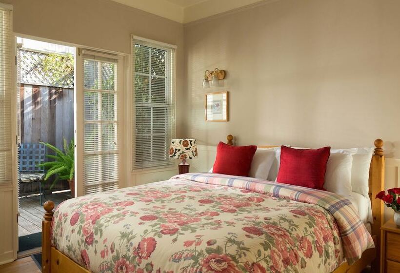 酒店 Cheshire Cat Inn & Cottages