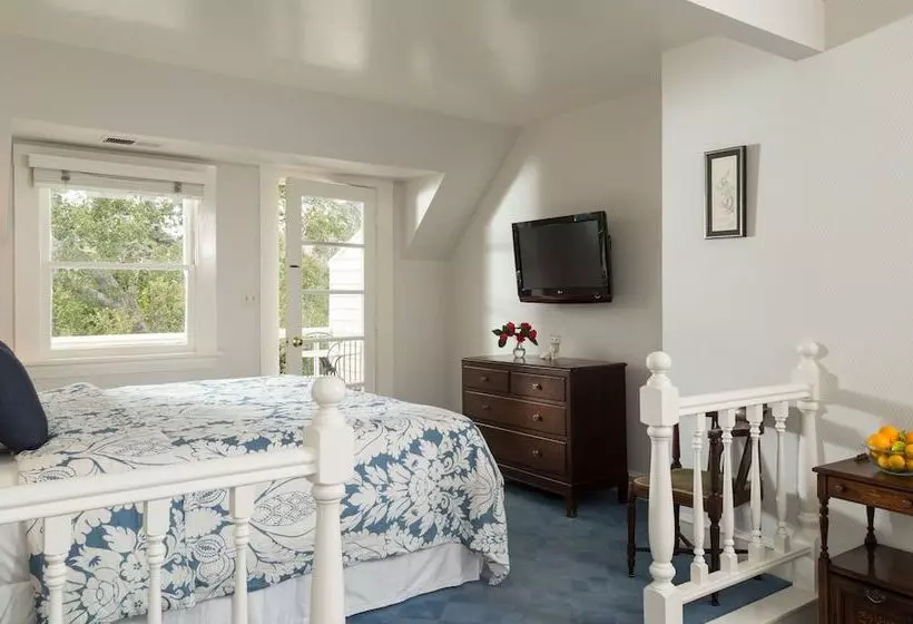 酒店 Cheshire Cat Inn & Cottages