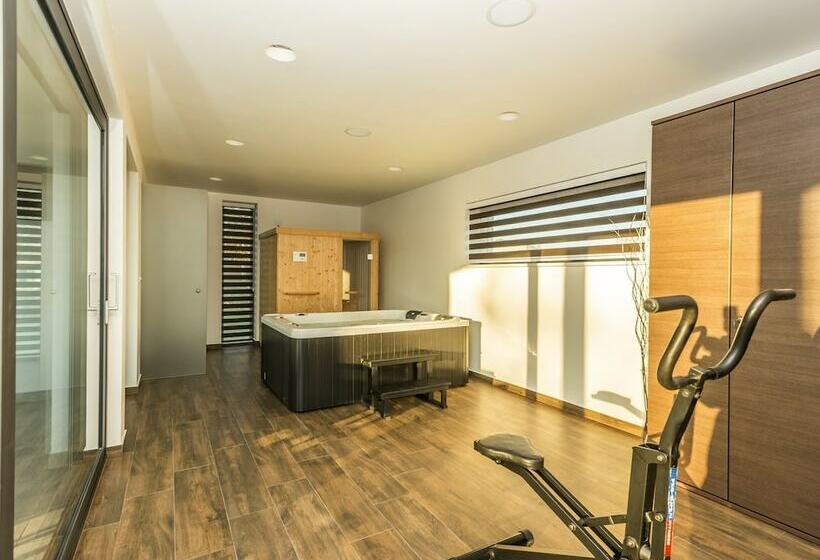 A Modern Luxury Villa With A Crystalclear Swimming Pool And Cultivated Garden