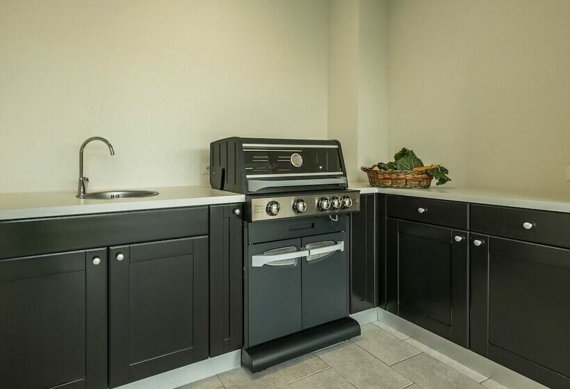 A Modern Luxury Villa With A Crystalclear Swimming Pool And Cultivated Garden