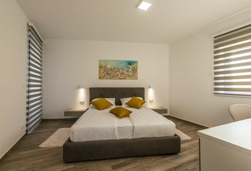 A Modern Luxury Villa With A Crystalclear Swimming Pool And Cultivated Garden