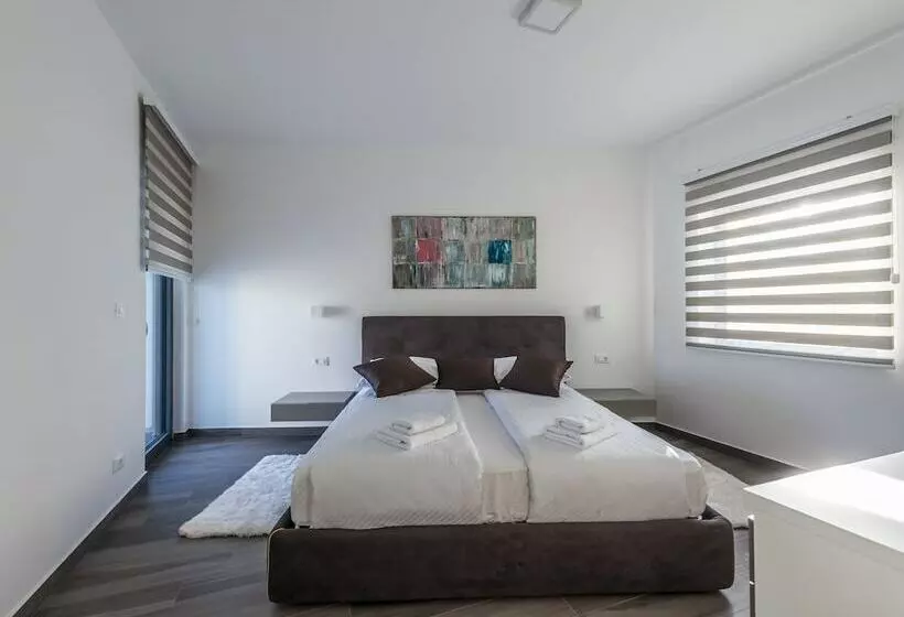 A Modern Luxury Villa With A Crystalclear Swimming Pool And Cultivated Garden