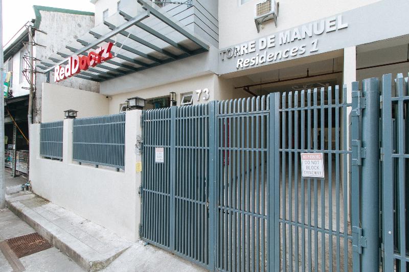 Отель Torre De Manuel Residences 1 By Reddoorz