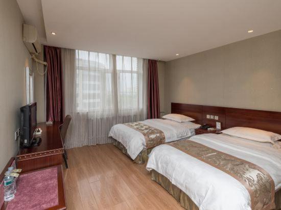 בית מלון כפרי Jinbaoli Business