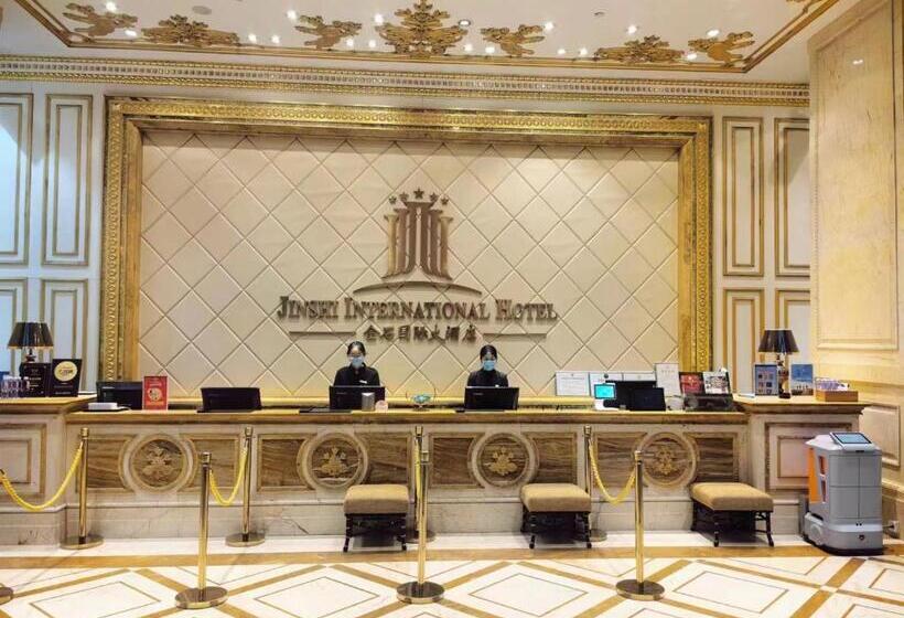 Отель Qingdao Jinshi International