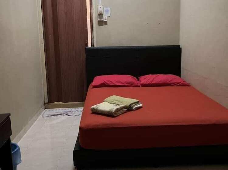 בית מלון כפרי Oyo Homes 90600 Ummi Chalet Dungun