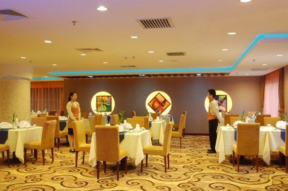 Отель Hualong Magnate