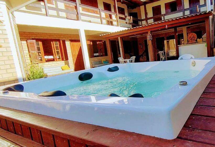 ユースホステル Pantai Pousadas Jacuzzi Aquecida E 300 Metros Da Praia Da Ferrugem