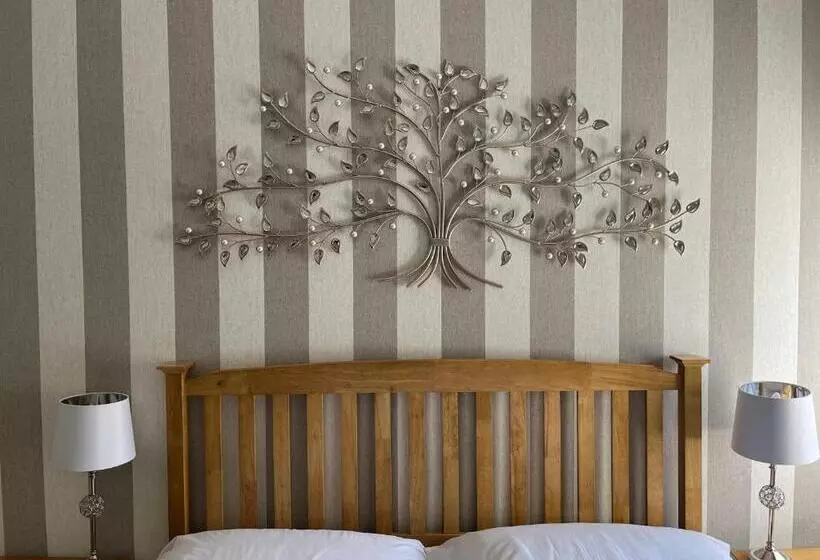 هتل Tides Reach Guest House