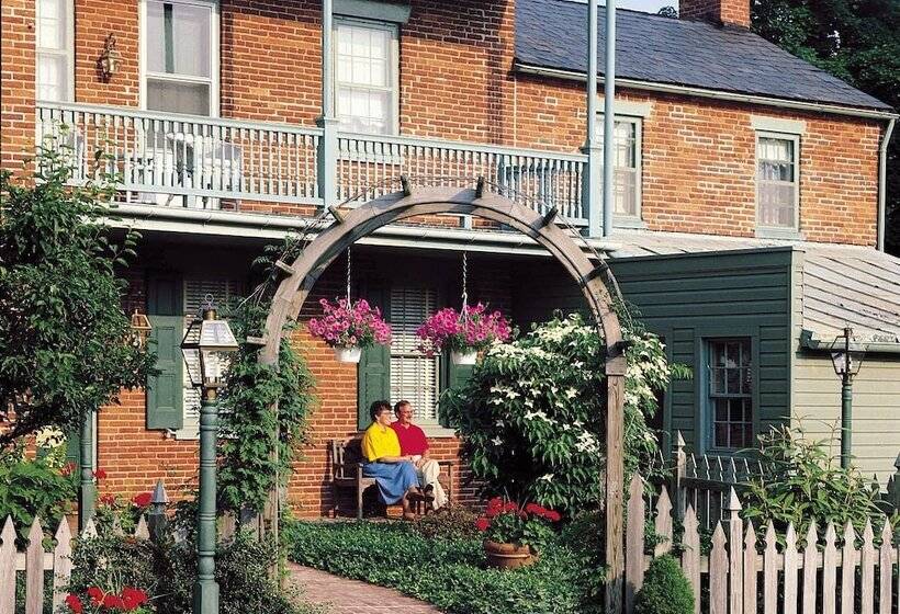 مبيت وإفطار Birdinhand Village Inn & Suites