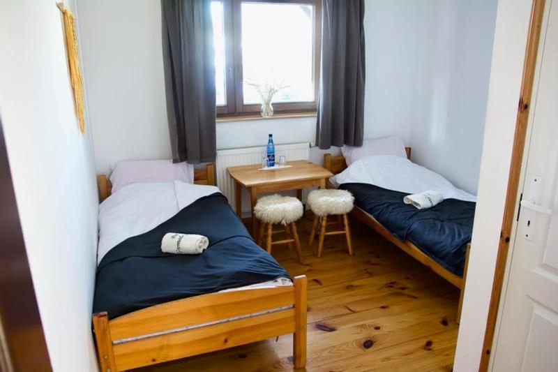 펜션 Noclegi Pod Gromadzyniem