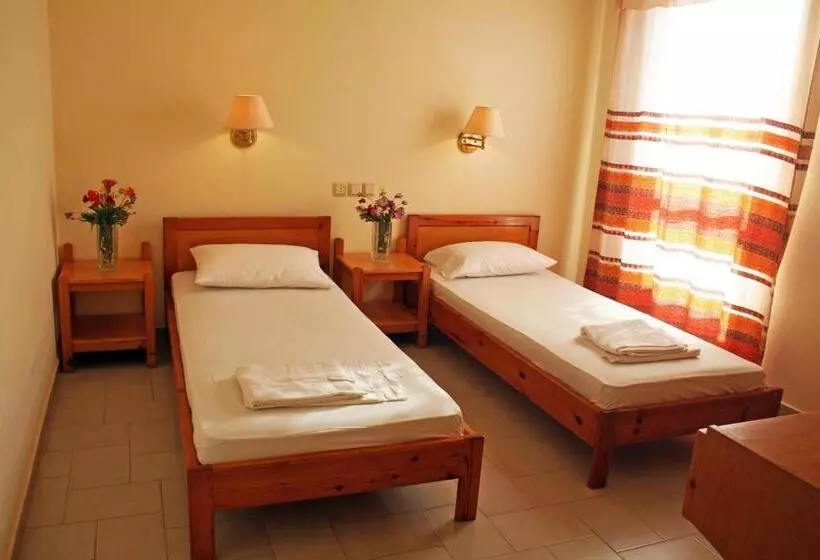 Отель Haris Apartments