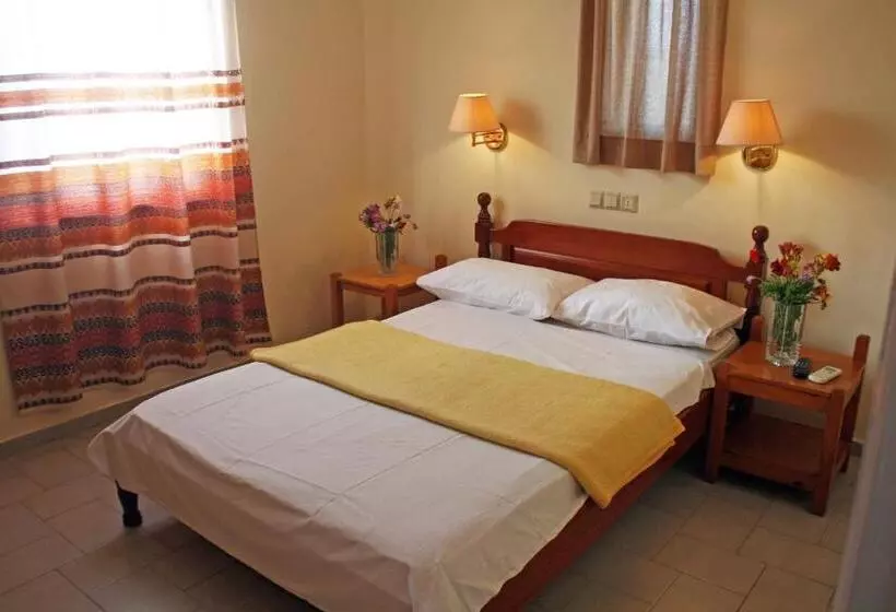 Отель Haris Apartments