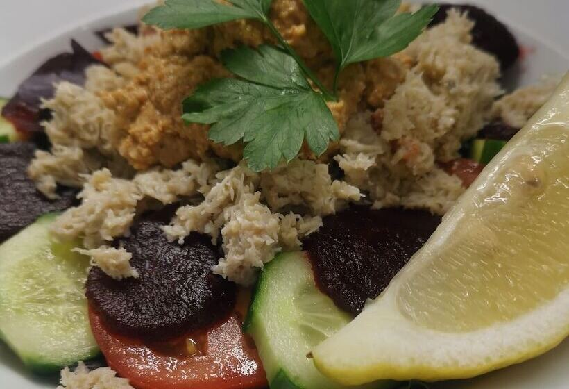 בית מלון כפרי The Dolphin Inn