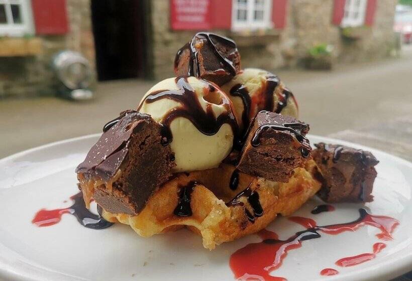 בית מלון כפרי The Dolphin Inn