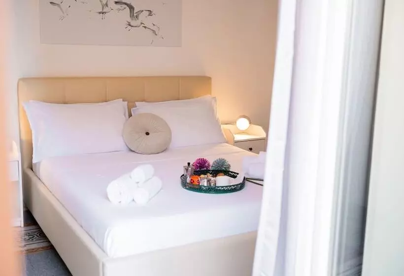تختخواب و صبحانه Ausa Suites