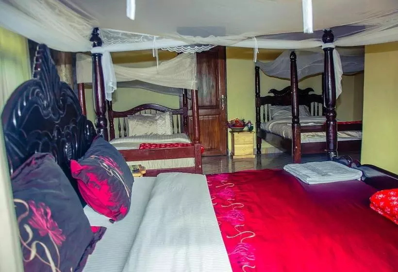 هتل Kyaninga Royal Cottage
