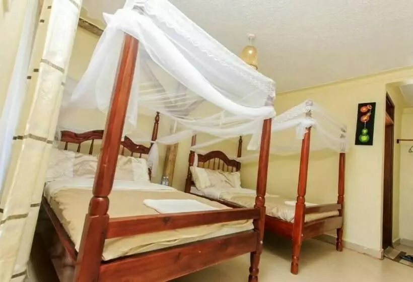 هتل Kyaninga Royal Cottage