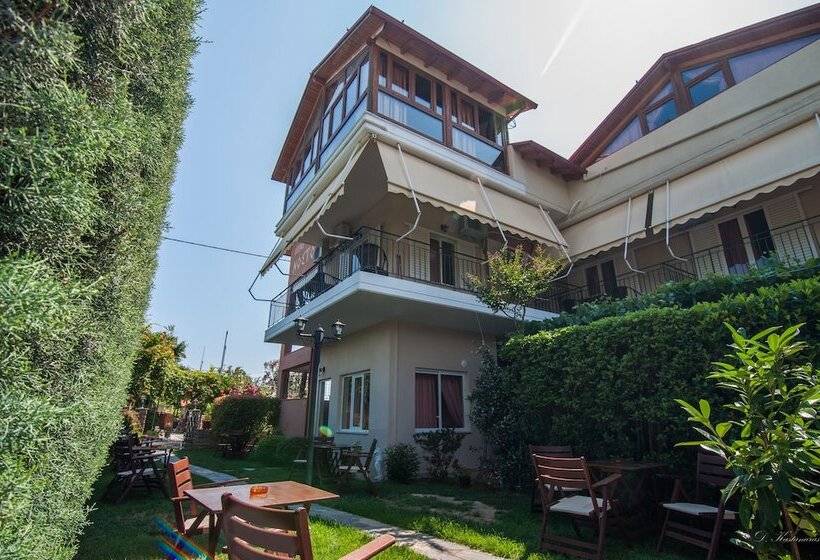 Отель Nostos Apartments