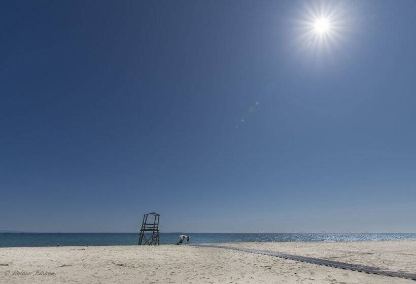 Отель Nostos Apartments