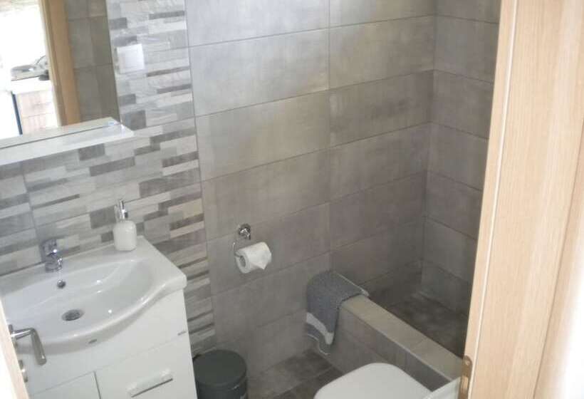 Отель Nostos Apartments