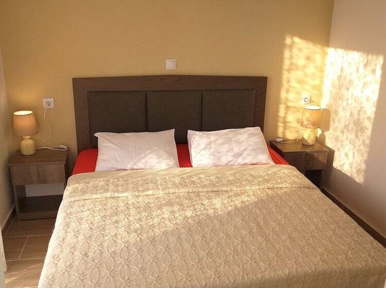 Отель Nostos Apartments