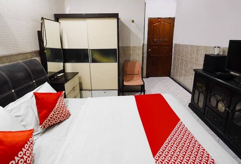 Отель Oyo 91195 Manisee 1 Homestay Syariah