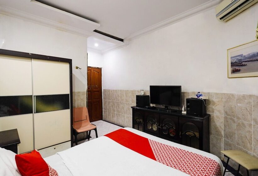 Отель Oyo 91195 Manisee 1 Homestay Syariah