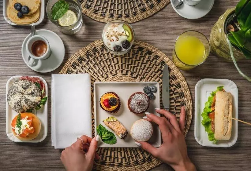 هتل Nido Suite & Apartments