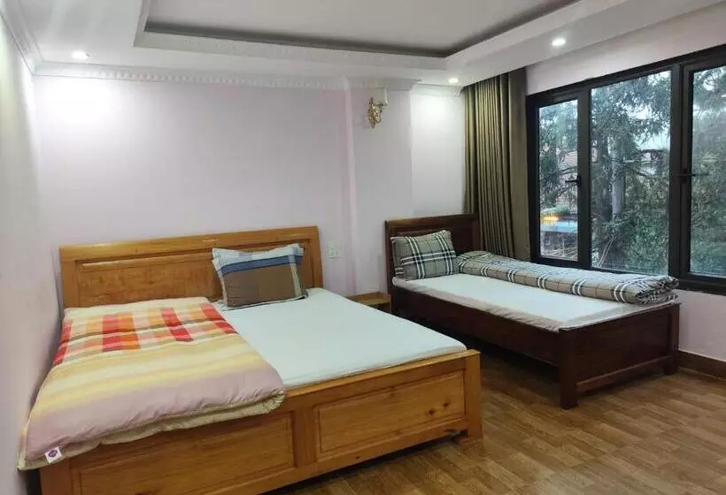 تختخواب و صبحانه Quê Hương House