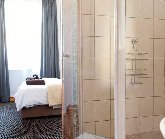 호스텔 Ashanti Gardens Guesthouse