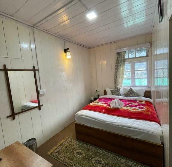 هتل Apple Valley Cottages Lachung