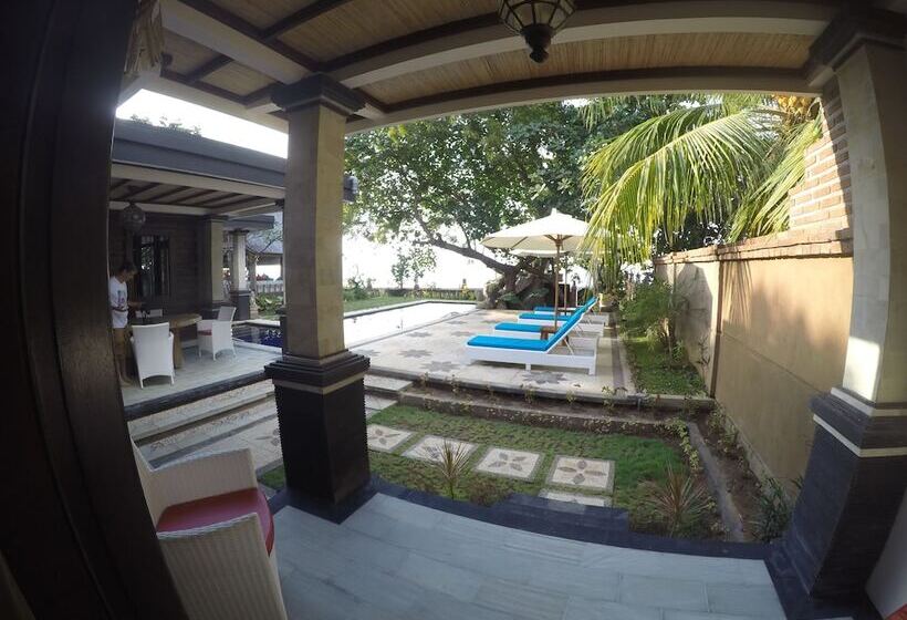 בית מלון כפרי Joglo On The Beach