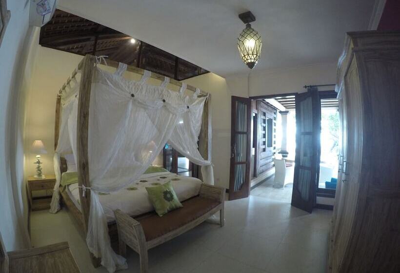 בית מלון כפרי Joglo On The Beach