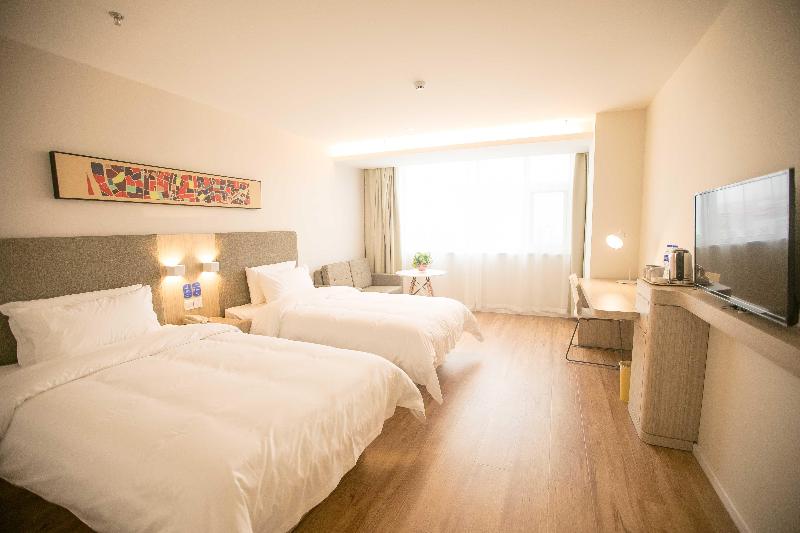 Отель Hanting  Puyang City Center Plaza